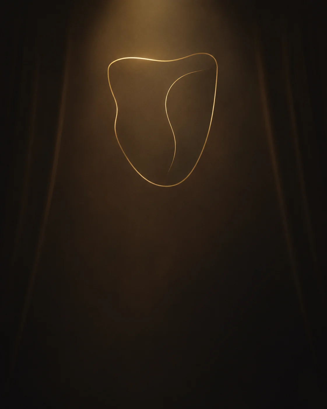 A theatrical mask illuminated in warm gold